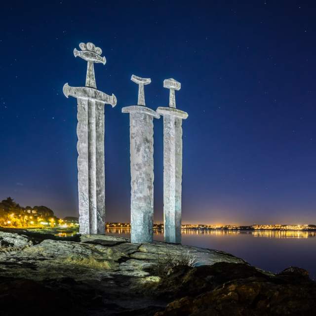 The Swords in Rock monument by Fritz Røed in Hafrsfjord, Fjord Norway