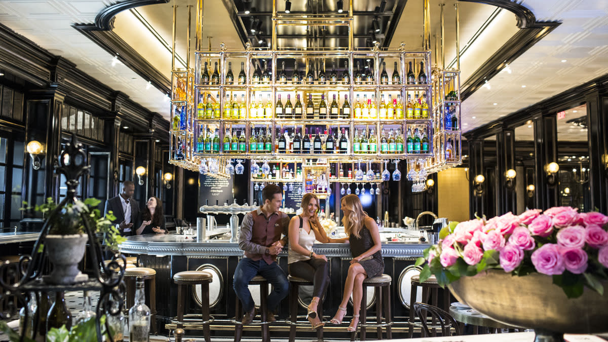 People sitting at the bar at Bardot Brasserie at ARIA in Las Vegas