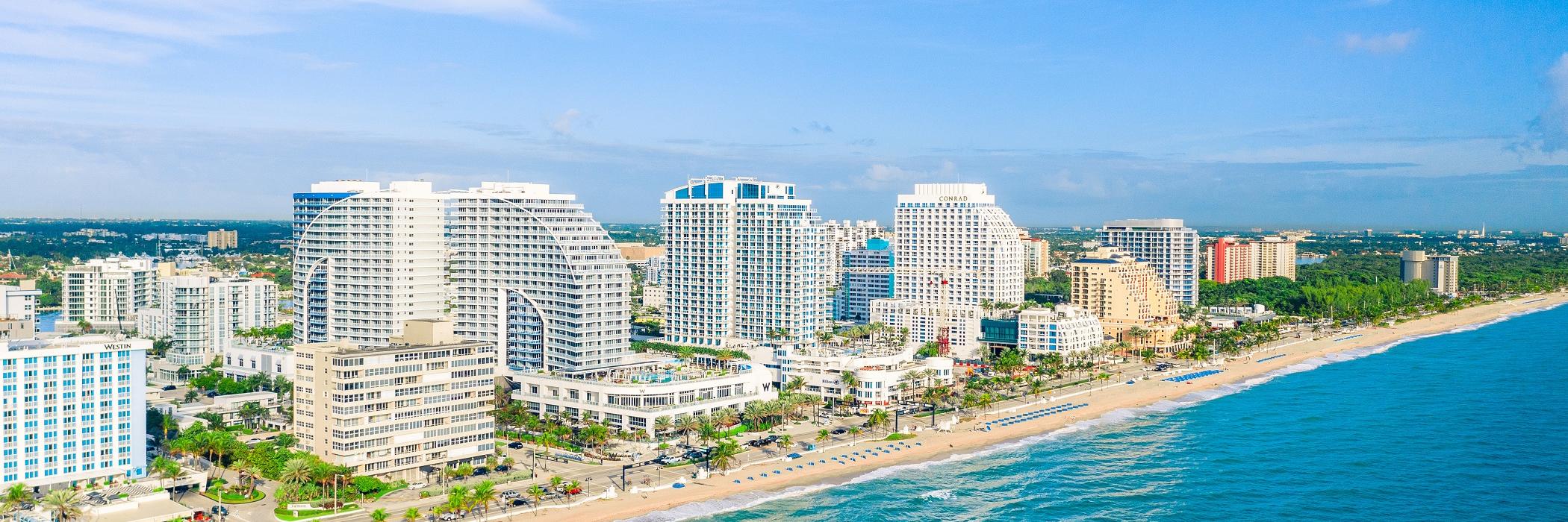 Aerial view of hotels along Fort Lauderdale beach taken from above the ocean to the east