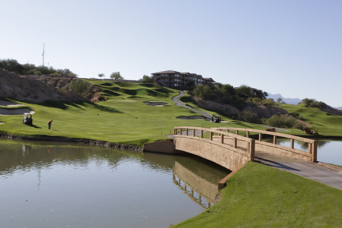 Take a swing at some golf balls on the stunning green fields of Wolf Creek Golf Club.