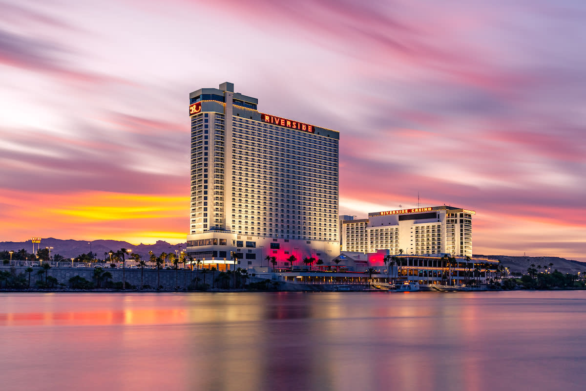 Beautiful sunset reflecting on the Colorado River in front of Don Laughlin's Riverside Casino & Resort.
