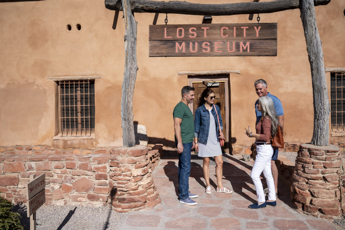 Two couples standing outside of the Lost City Museum in Mesquite.