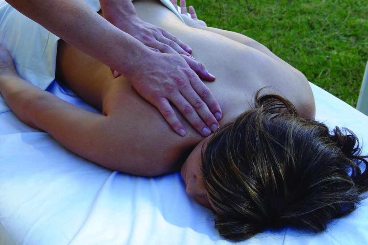 A woman getting a massage at the The Spa & Salon at CasaBlanca Resort-Casino-Golf-Spa.