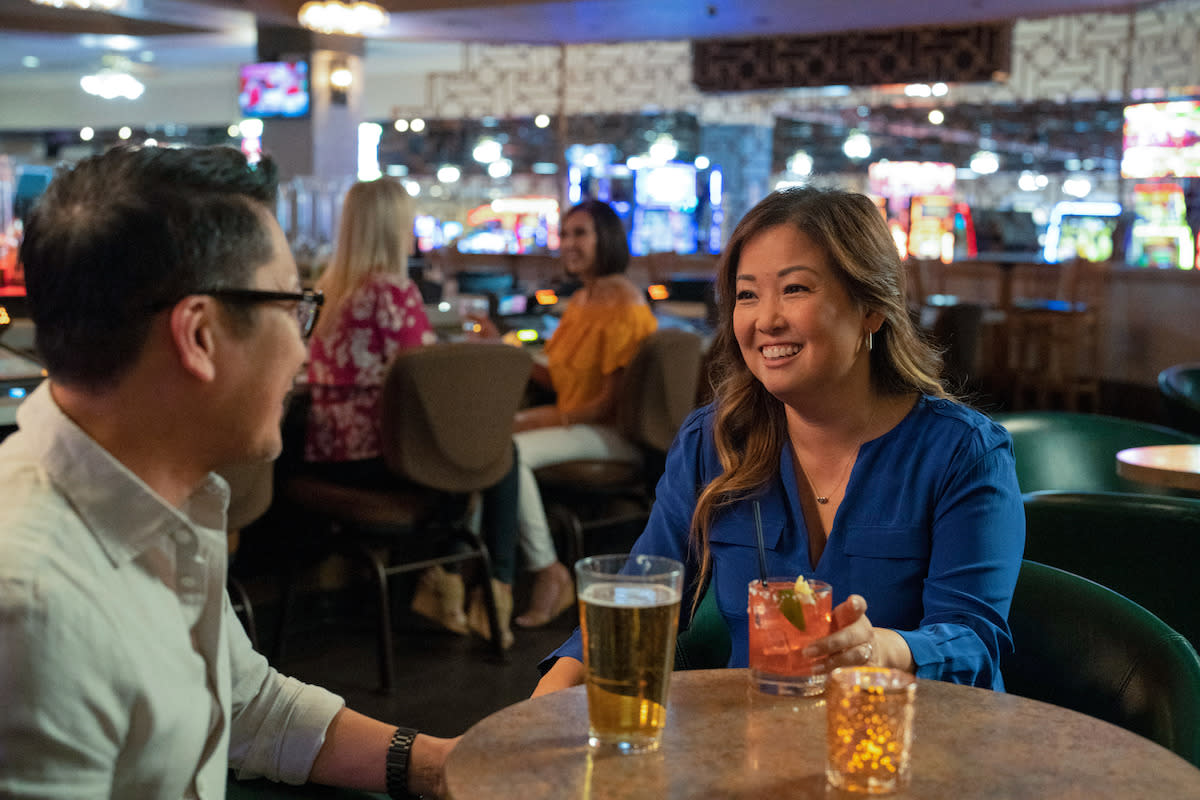 A couple enjoying drinks at Tango’s Lounge at Tropicana Laughlin.