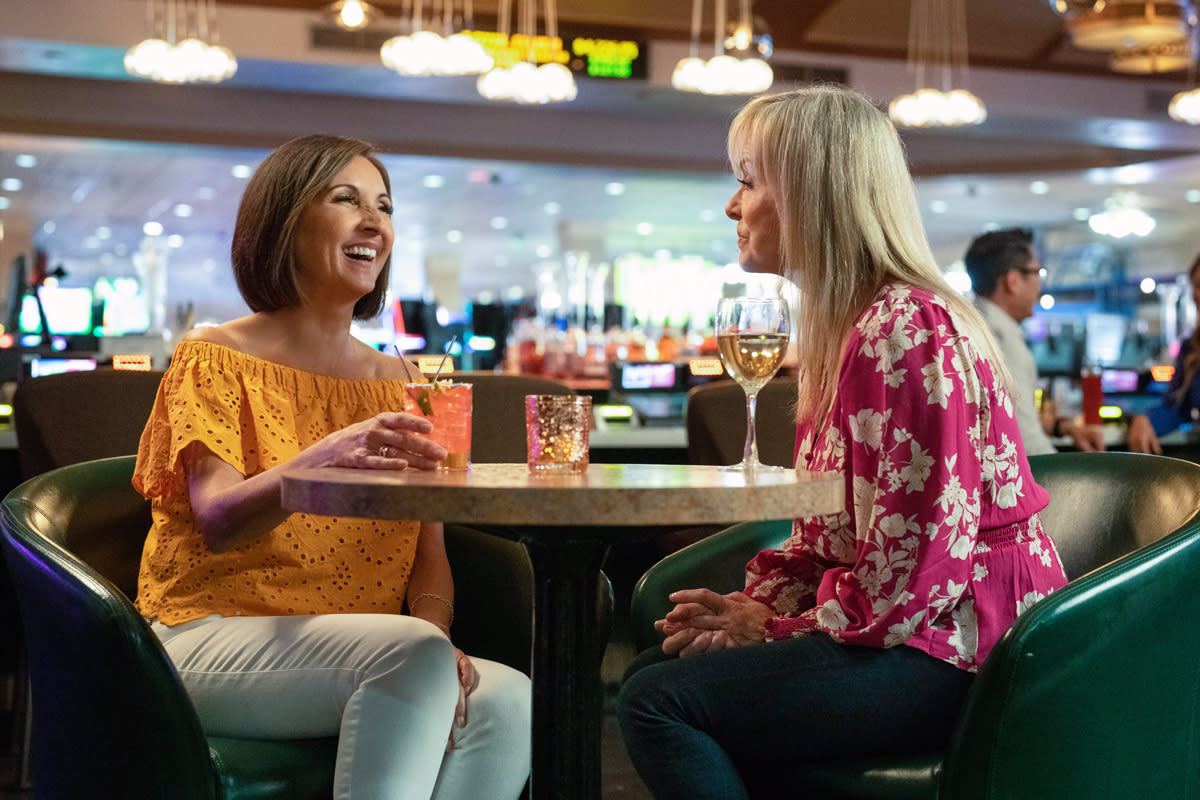 Two women enjoying drinks and a wonderful conversation at Tango's Lounge in Tropicana Laughlin Hotel and Casino in Laughlin, Nevada.