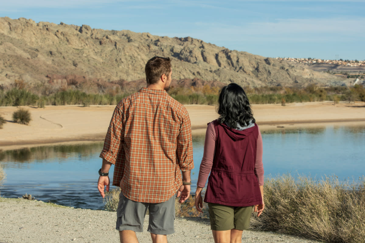 A couple taking a lovely walk at the Heritage Greenway Park & Trails.