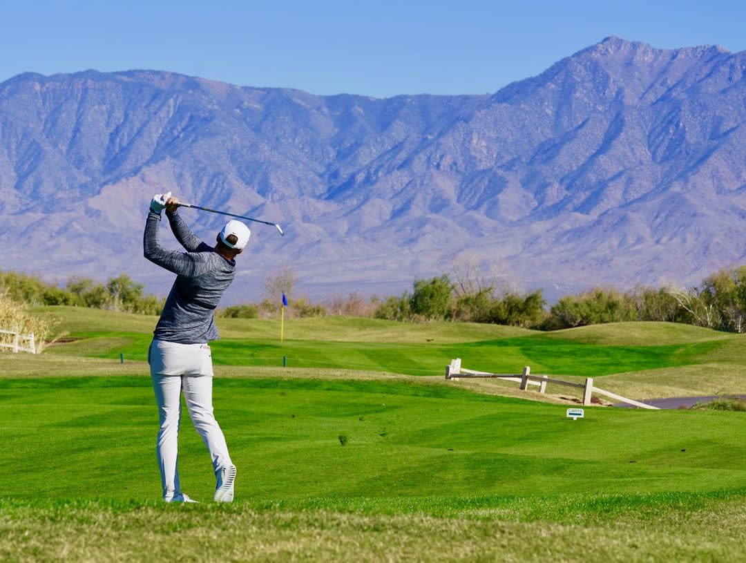 man golfing