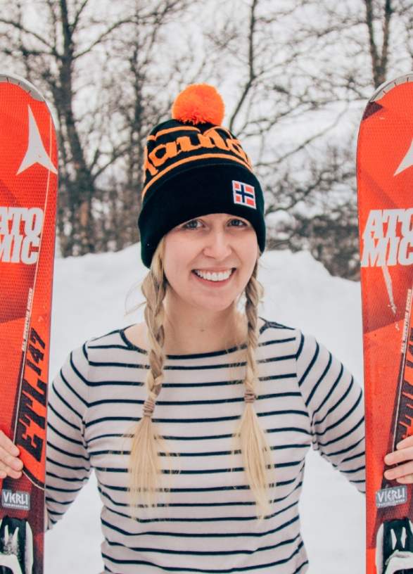 American Silvia Lawrence posing with skiis