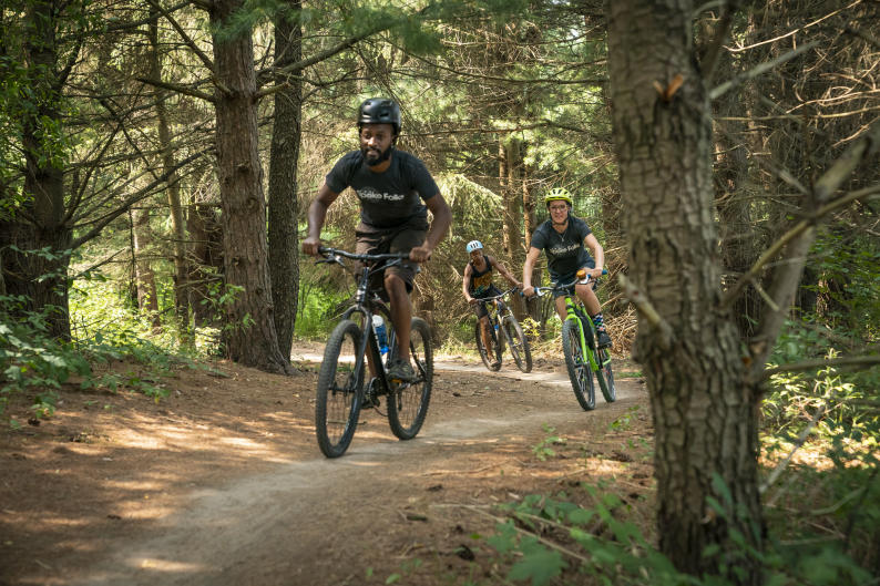 Mountain bikers on a trail near Grand Rapids