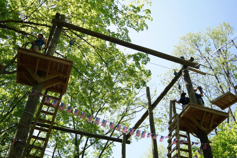 Explore zip lines, try out obstacle courses, and enjoy the views at TreeRunner Adventure Park