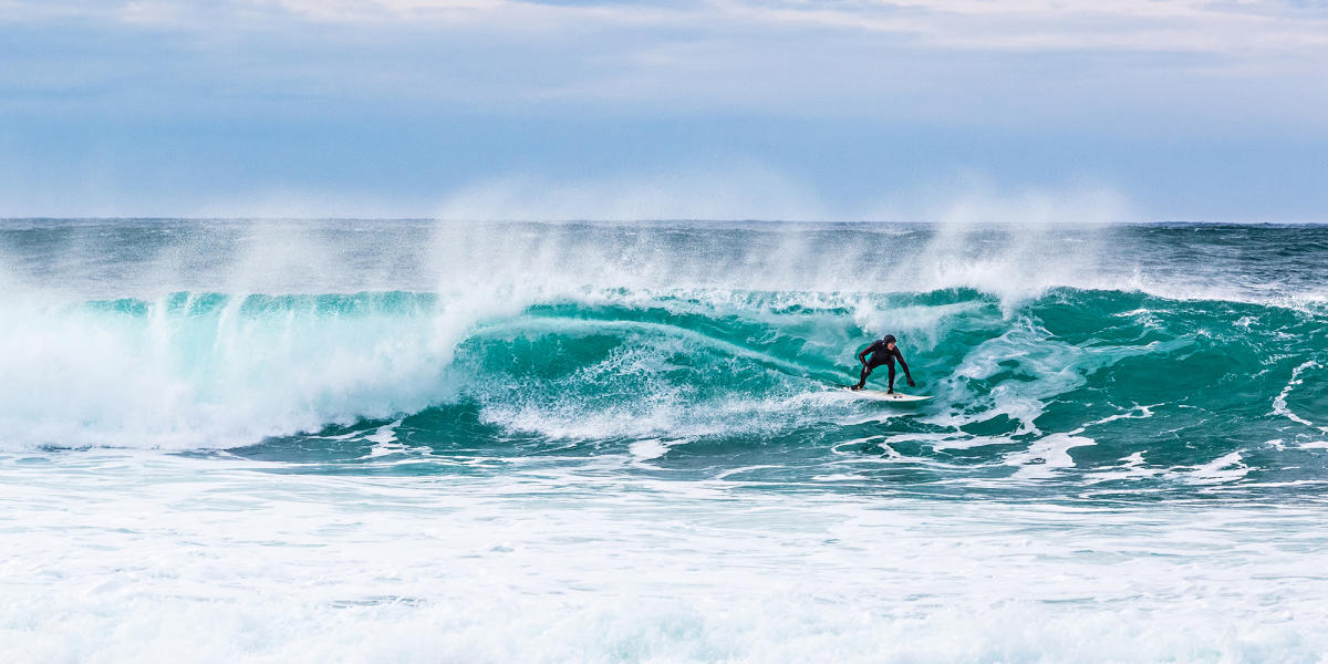 Surf’s up! Amazing images from Lofoten’s Arctic surfing paradise goes viral