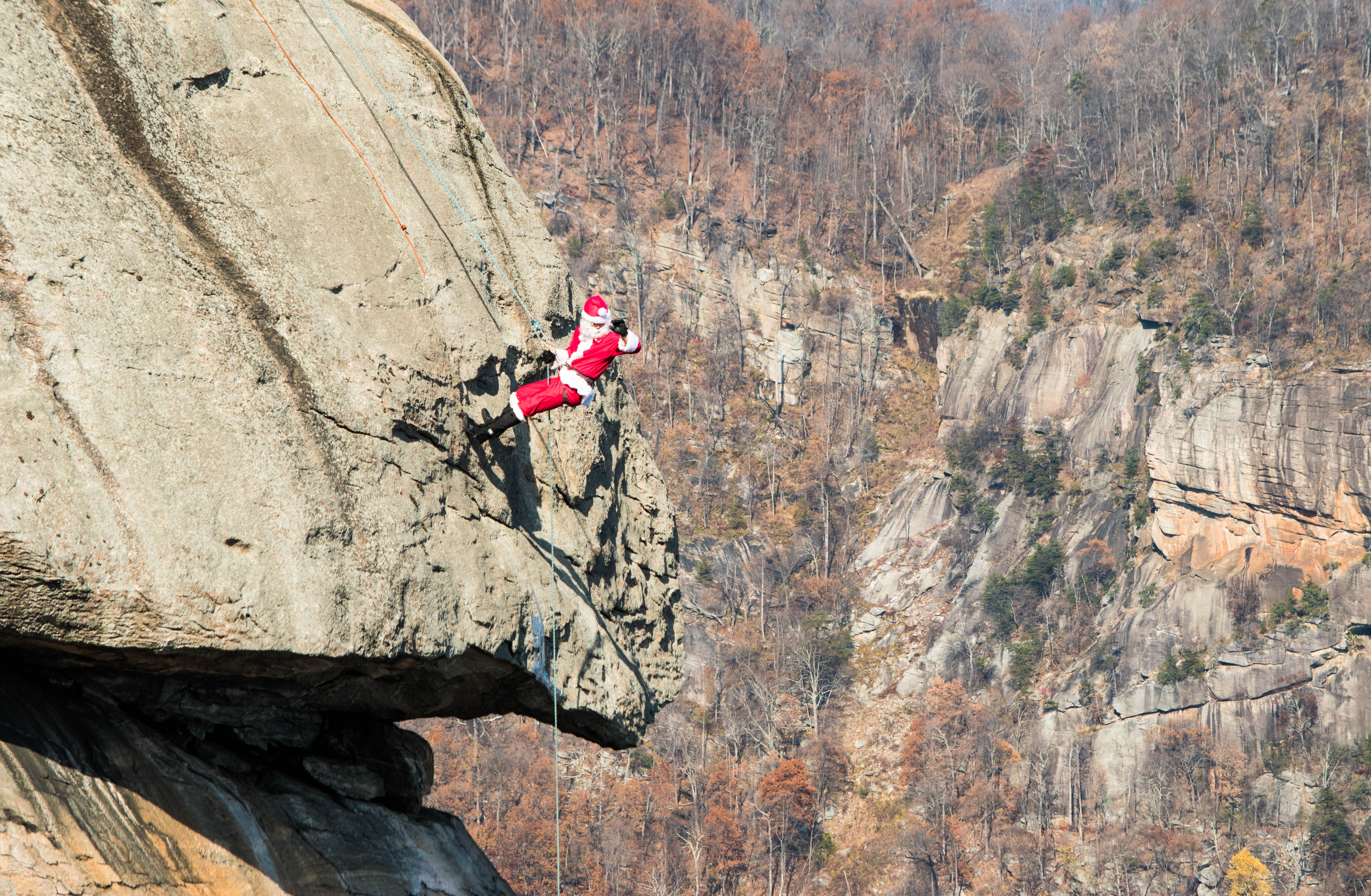 Santa rappels down Chimney Rock near Asheville, NC