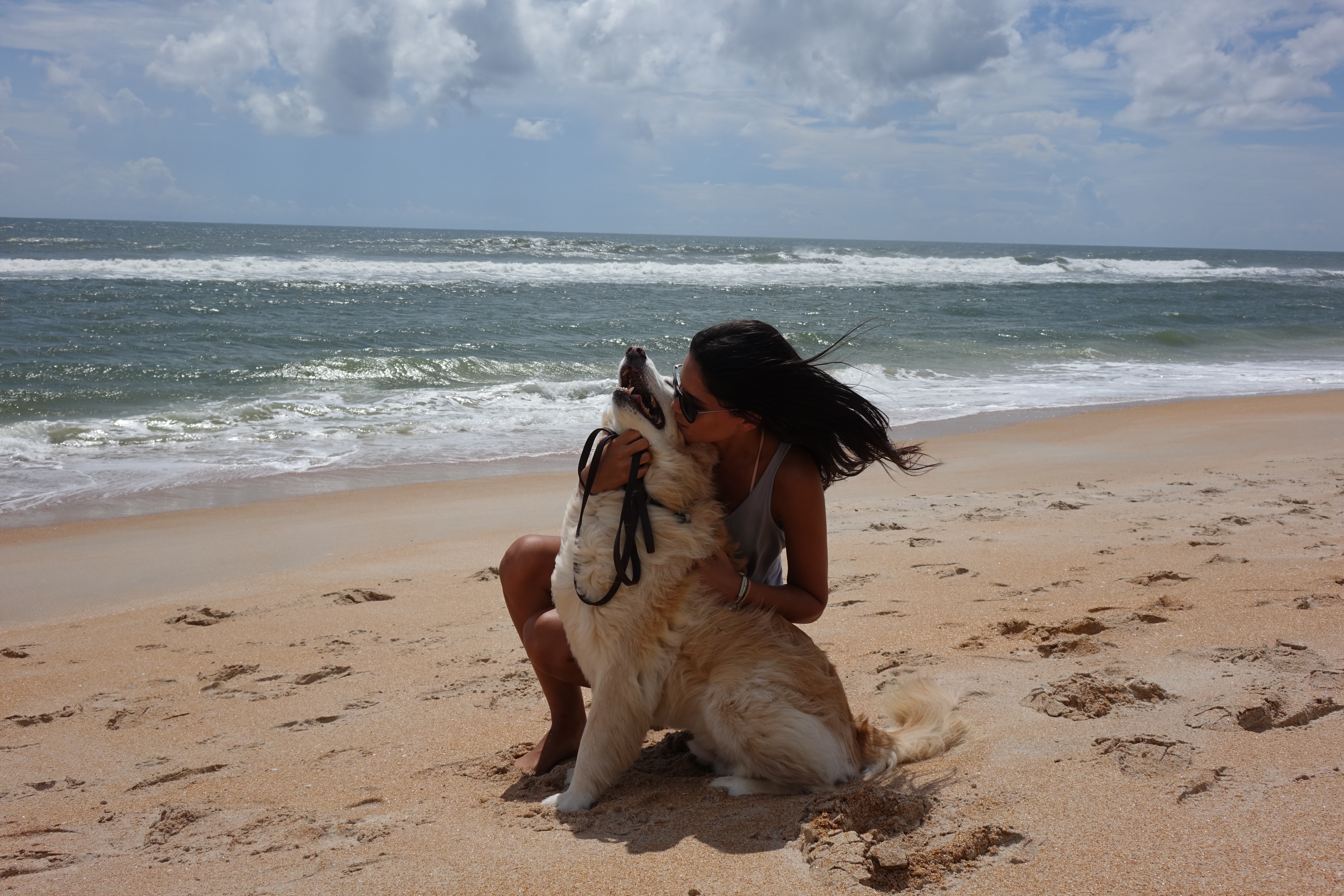 Woman & dog on Flagler Beach