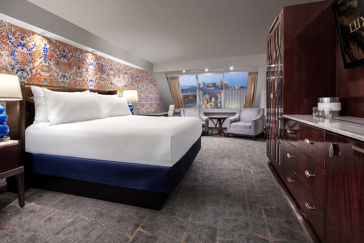 Ornate Las Vegas hotel lobby with chandelier and marble floors