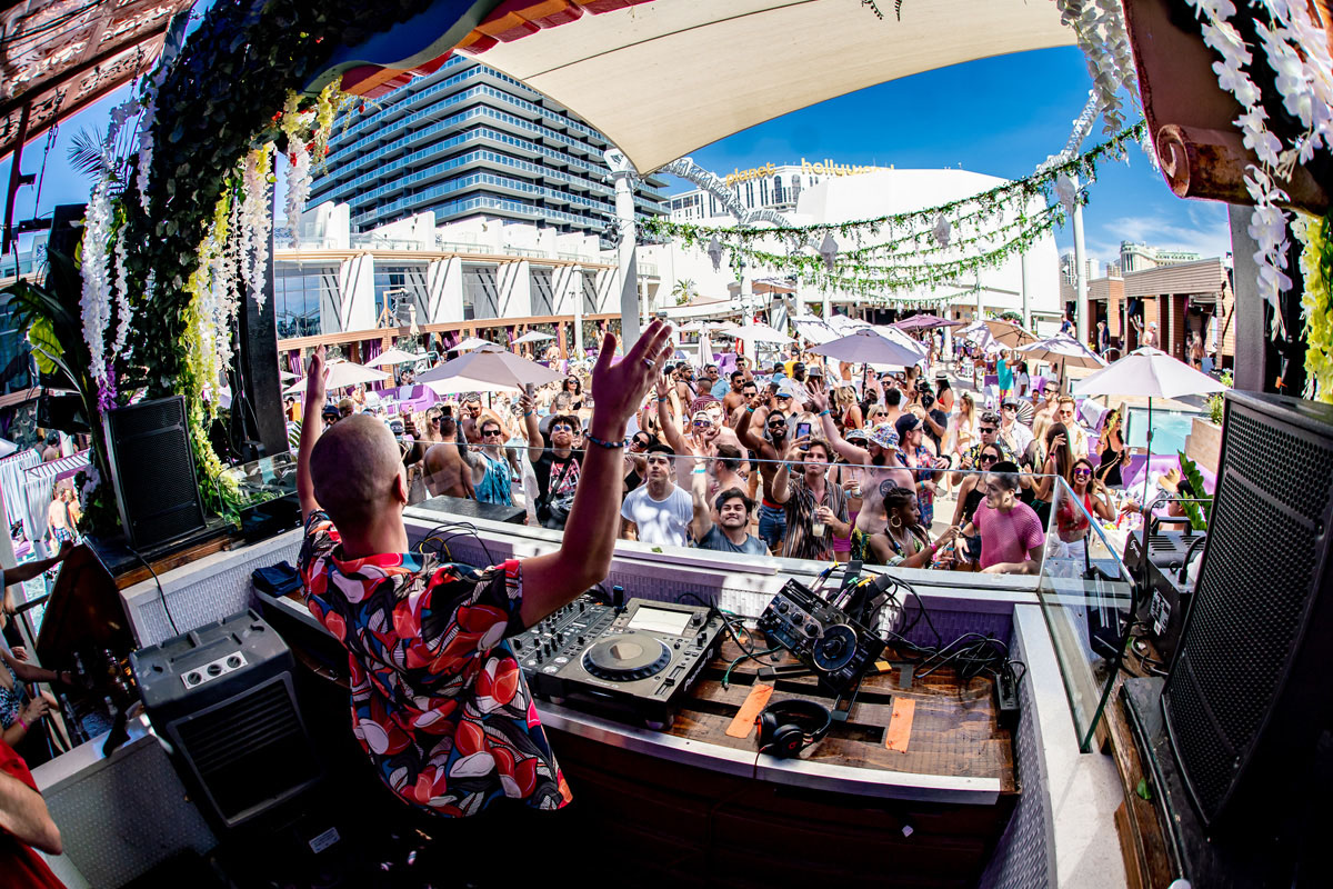 Marquee Dayclub at The Cosmopolitan Las Vegas with rooftop pool, cabanas, and crowds