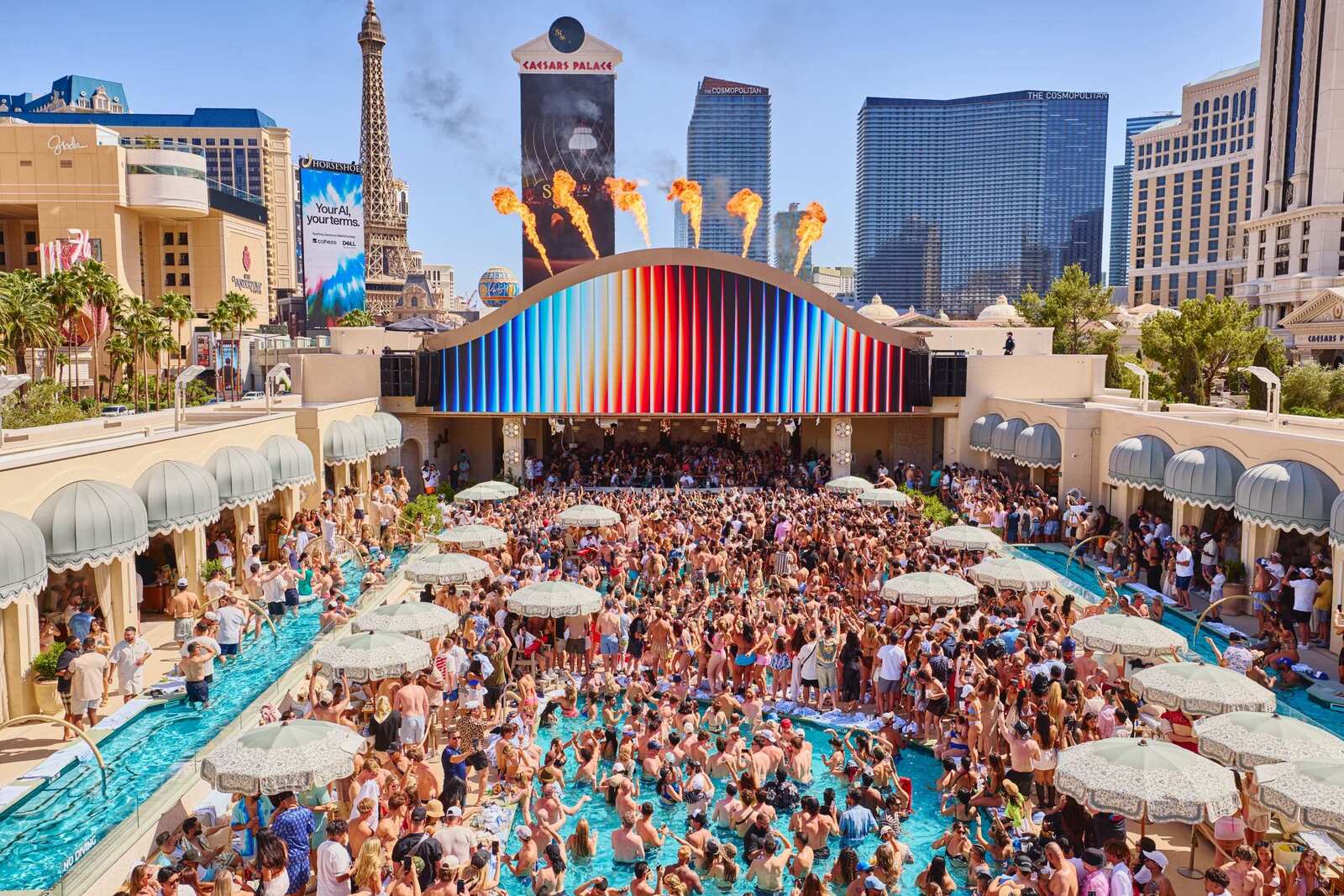 OMNIA Dayclub at Caesars Palace poolside with cabanas and DJ stage