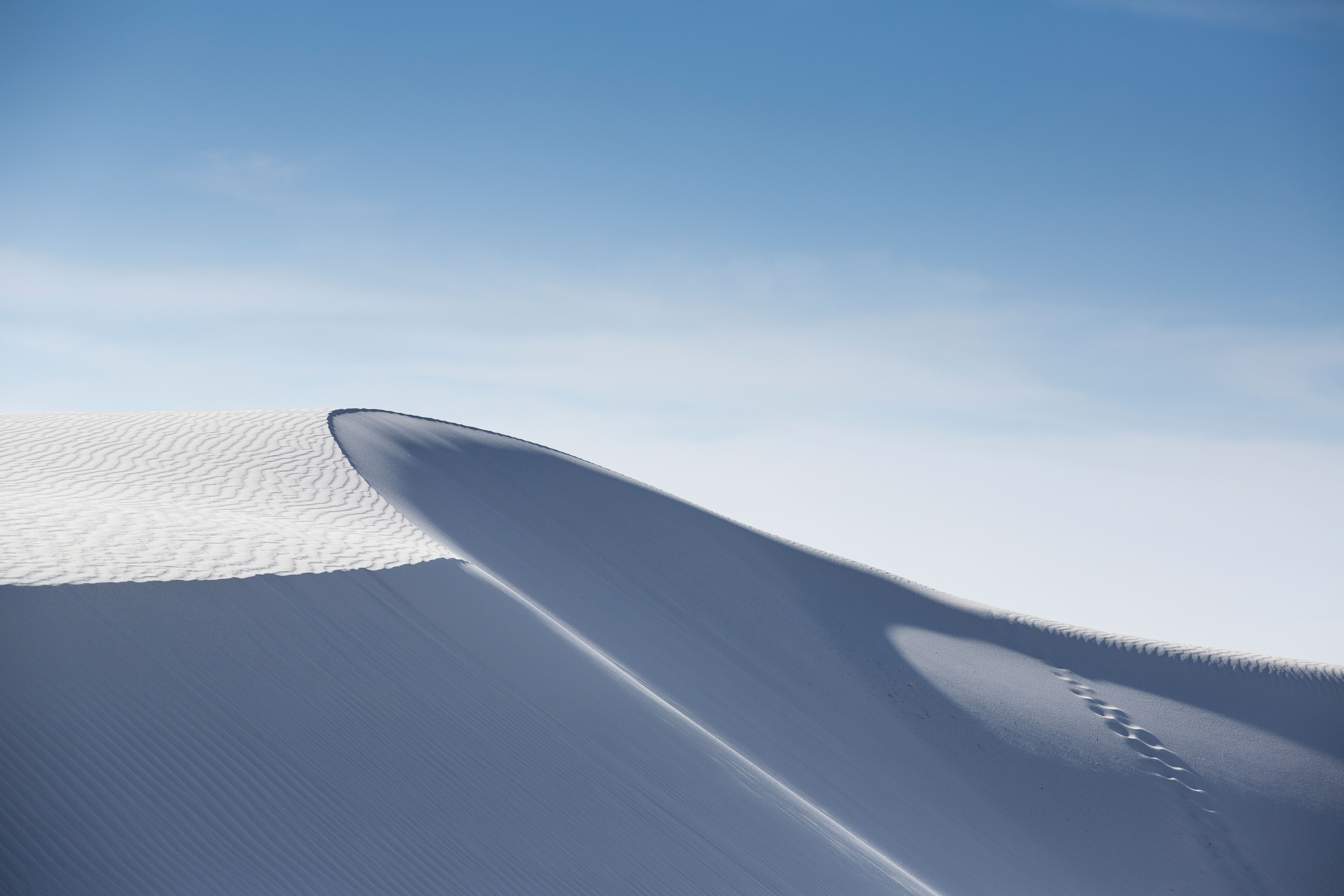 A large white sand dunes in White Sands National Monument