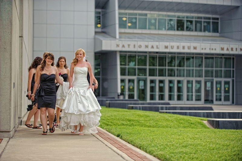 bride and bridesmaids walking outside at national museum of the marine corps