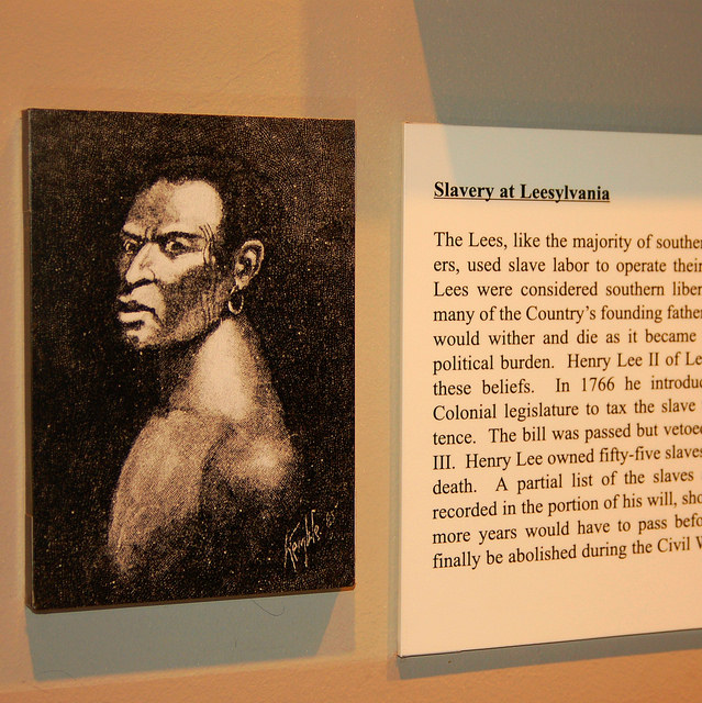 drawing of a representation of a slave alongside text explaining the history of slavery at Leesylvania