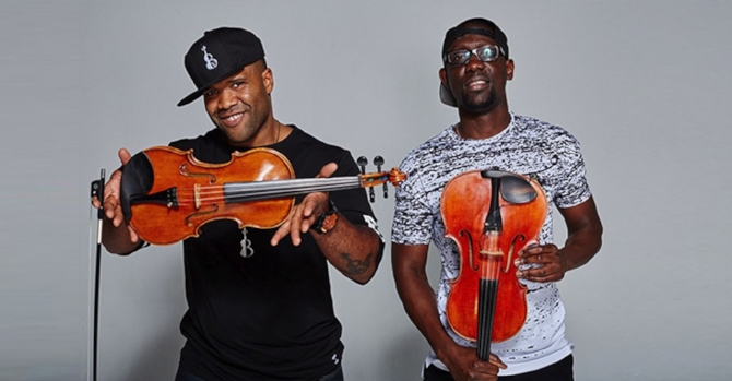 black violin band poses for photo